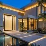 Contemporary pivot door with clean lines and tropical garden in South Florida