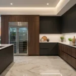 Kitchen Modern Miami kitchen with dark wood and matte black cabinets, marble flooring, built-in stainless steel appliances, and a large island overlooking the sunset.