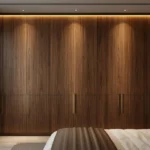 Luxury bedroom wardrobe with custom cabinetry and integrated lighting