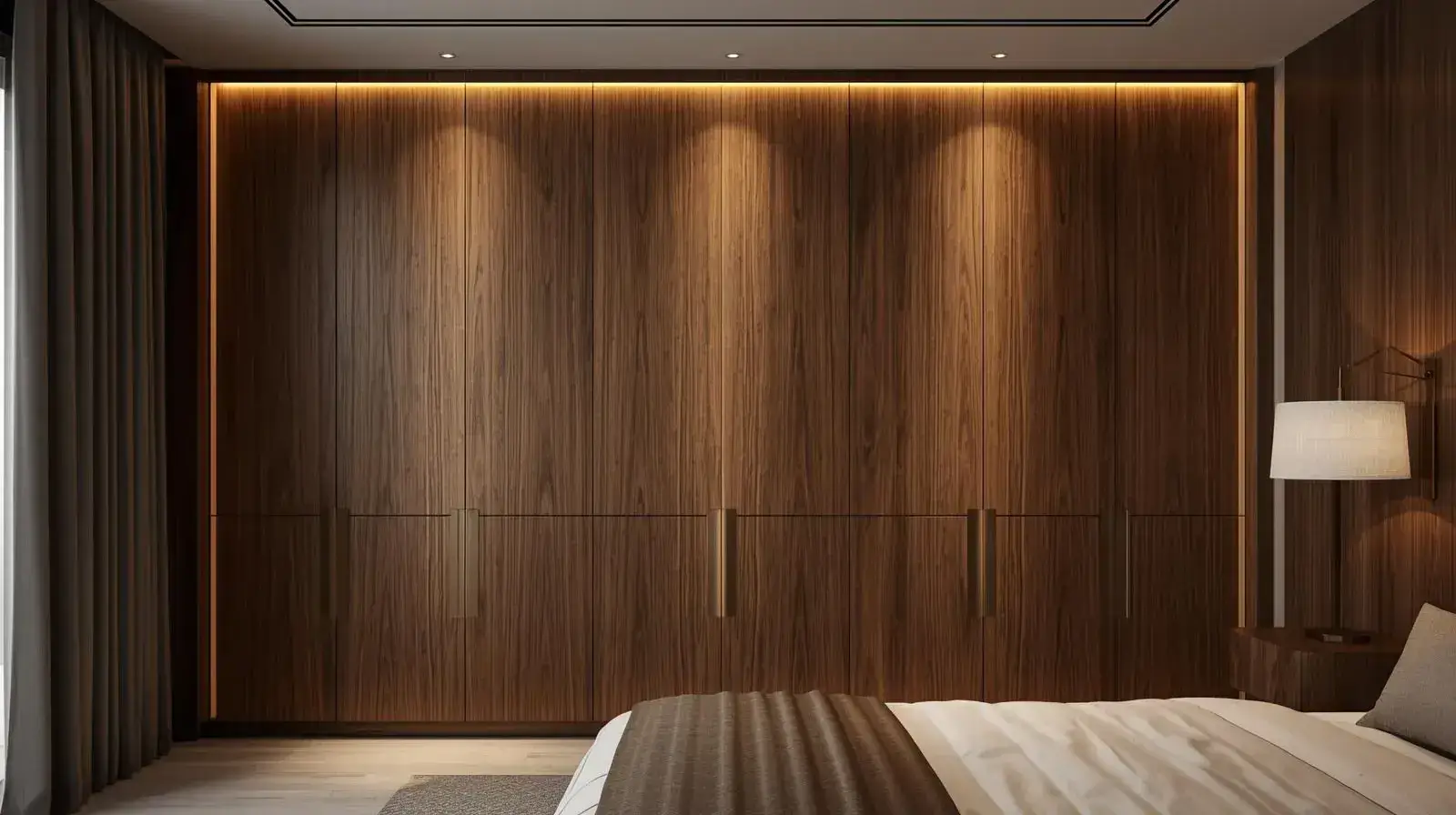 Luxury bedroom wardrobe with custom cabinetry and integrated lighting