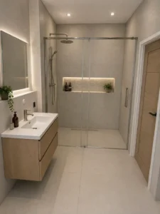 bathroom remodeling after the fact picture, gray tiles niches oak vanity and interior door