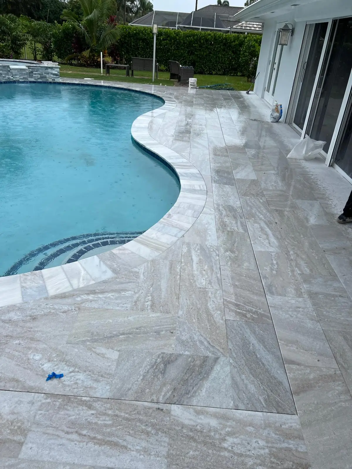 swimming pool tiles pavers travertino stone around pool