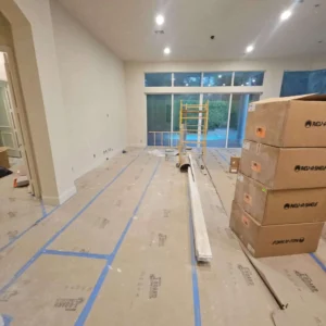 protected floor during installation of kitchen cabinets