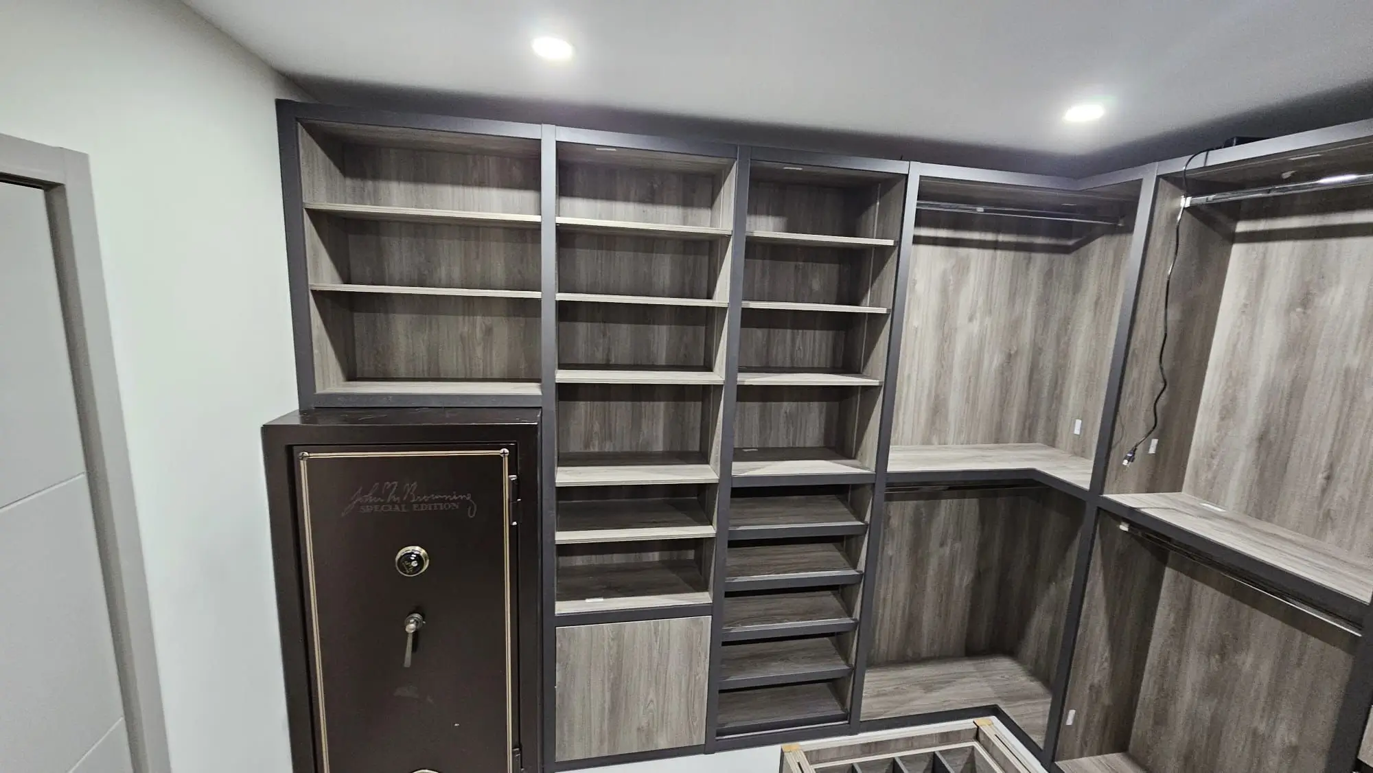 walking closet with lights and leather finish 1