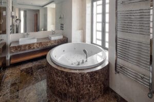luxury bathroom interior and hot tub style bath.
