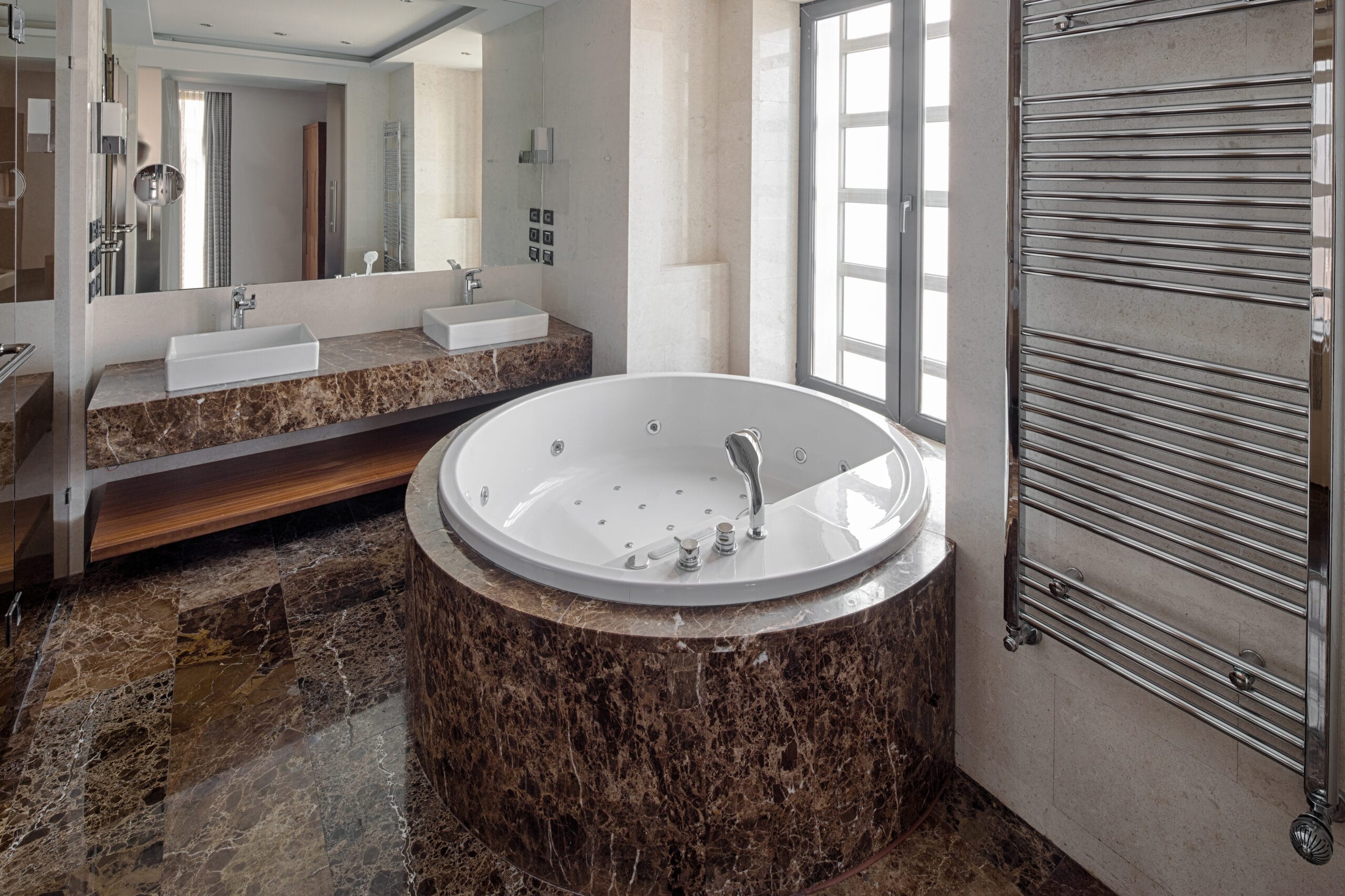 luxury bathroom interior and hot tub style bath.