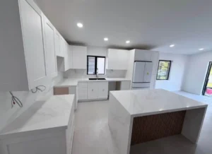 white shaker cabinets with island